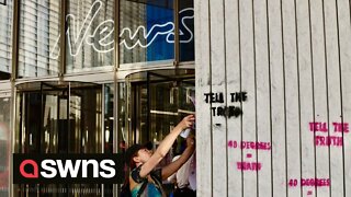 Extinction Rebellion activists smash windows to News UK offices at London Bridge