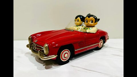 Astro Boy cruising like a boss in a 300SL convertible !