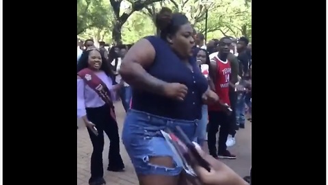 Woman puts on epic dance moves for the crowd