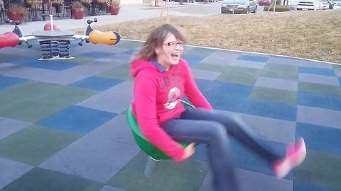 Girl Questions "What Is Life?" (LOL!) After Spinning On Dizzy Playground Seat