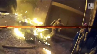 Fire Dept. Releases Dramatic Video of Toddler Dropped from Window of Burning Building