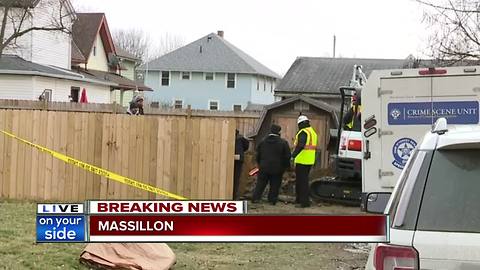 Police search backyard of Massillon home where body of man was buried