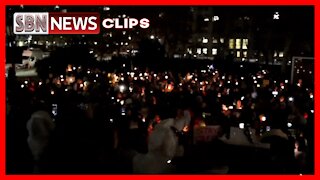 PROTESTERS SING "ONE LOVE" DURING A CANDLE LIGHT VISUAL AT FOLEY SQUARE IN NEW YORK CITY - 5206