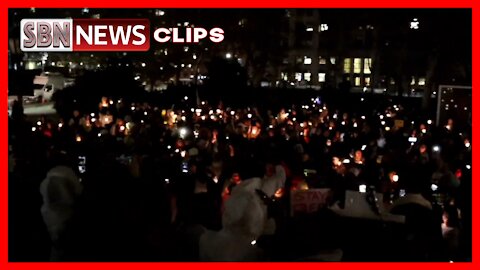 PROTESTERS SING "ONE LOVE" DURING A CANDLE LIGHT VISUAL AT FOLEY SQUARE IN NEW YORK CITY - 5206