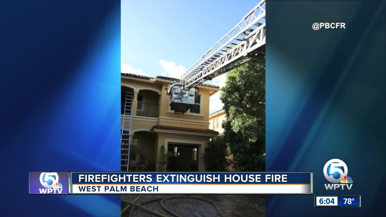 Firefighters extinguish house fire in West Palm Beach