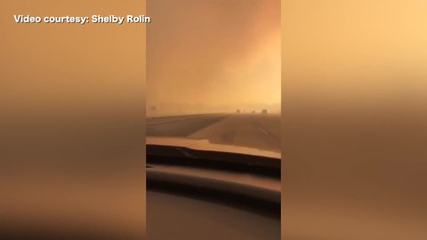 Motorist drives through RyeFire along Interstate 5 in Southern California