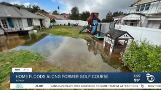 Home floods along former golf course in Poway