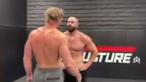 Logan Paul and Bradley Martyn caught a friendly fade backstage