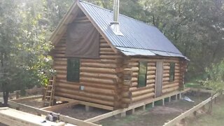 Off Grid Log Cabin Build #25b Porch, Wood Pier Foundation