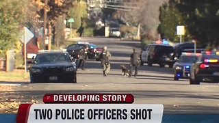 Polices officers in hospital after getting shot