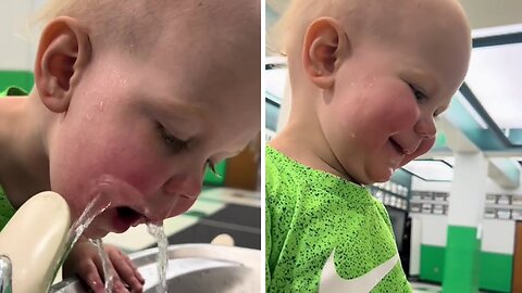 Thirsty baby can't figure out drinking fountain