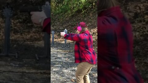 Flannel Lady Shooting 9mm