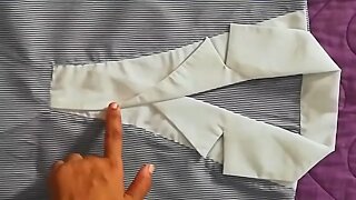 Uniform coat collar cutting and stitching.