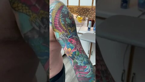 Beautiful Koi Fish Arm Tattoo