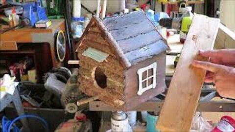 Log cabin birdhouse from scraps.