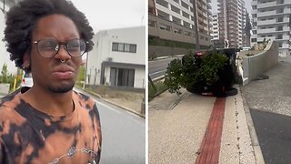 Okinawa Resident Nonchalantly Walks Outside During Typhoon Khanun