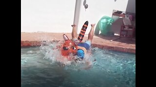 Man tries to jump on pool float but fails