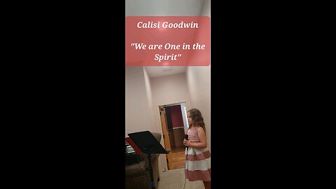 Calisi Goodwin singing "We are One in the Spirit"