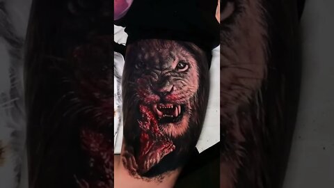 Incredible Hungry Lion Tattoo