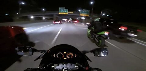 Sport bikes ripping through the freeway at night