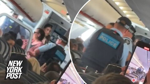 Entire plane bursts into song as 'drunk Karen' booted off flight: video