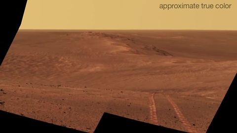 Mars rover looks back at tracks on crater rim