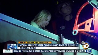 Woman taken into custody after climbing onto roof of Mission Beach business