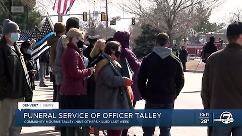 Procession for Officer Eric Talley: Denver7's Veronica Acosta reports from crowded street as residents await procession to arrive in Lafayette