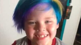 Kid loves his new rainbow hair