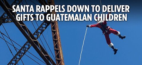 Santa rappels down to deliver gifts to Guatemalan children