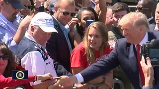 President Trump signs shoes, takes selfies with supporters