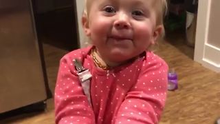 Little Girl Loves Eating Peanut Butter