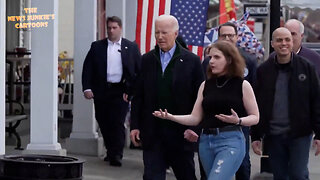 Hecklers yell "Loser!" while Biden shuffles to a coffee shop.