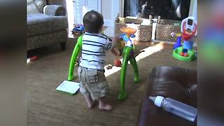 Baby Boy Learns How To Walk With A Baby Walker Toy