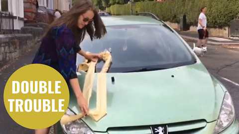 Prankster 'paints' double yellow lines OVER a car after motorist refused to move it