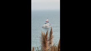 Patriotic Sail Boat proudly flying our Colors makes an impressive turn.