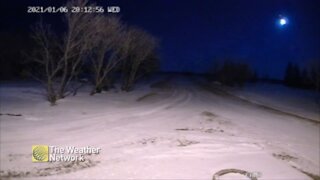 Camera catches the moment a meteor streaks across the night sky