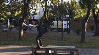 Talented Skateboarder Juggles Pins While Performing Trick