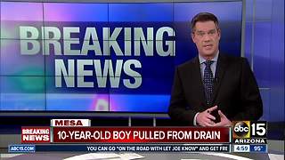 Young boy pulled from storm drain in Mesa