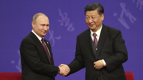 Putin Stands By China, Criticizes US At Economic Forum