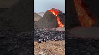 Volleyball near an erupting volcano
