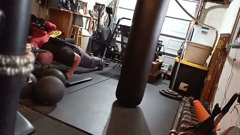 45 LB Isometric Knuckle Pushups For 10 Seconds Up 10 Seconds Down For 1 Minute.