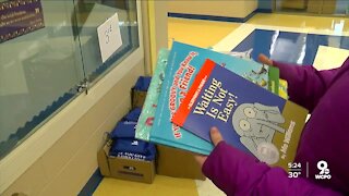 Free books at Christ Hospital encourage reading to newborns, lifelong literacy