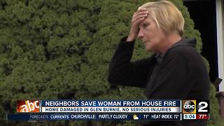 Neighbors save woman from house fire