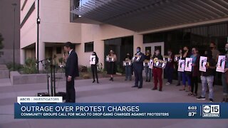 Outrage over gang charges for police protesters in Phoenix
