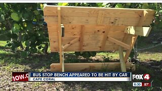 Bus stop bench appeared to be hit by car