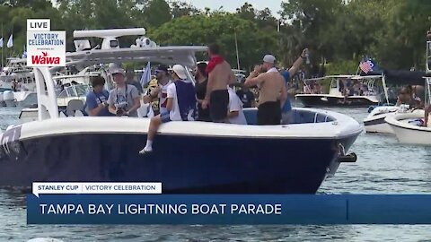 Alex Killorn with WWE belt at boat parade