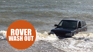 Shocking footage shows Range Rover washed out to sea