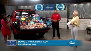 Larry H Miller and Pack A Backpack