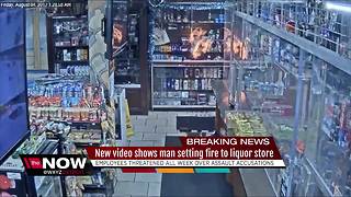 New video shows man setting fire to liquor store